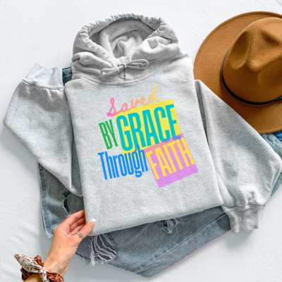 Saved by Grace Through Faith hoodie in Ash, folded flat lay