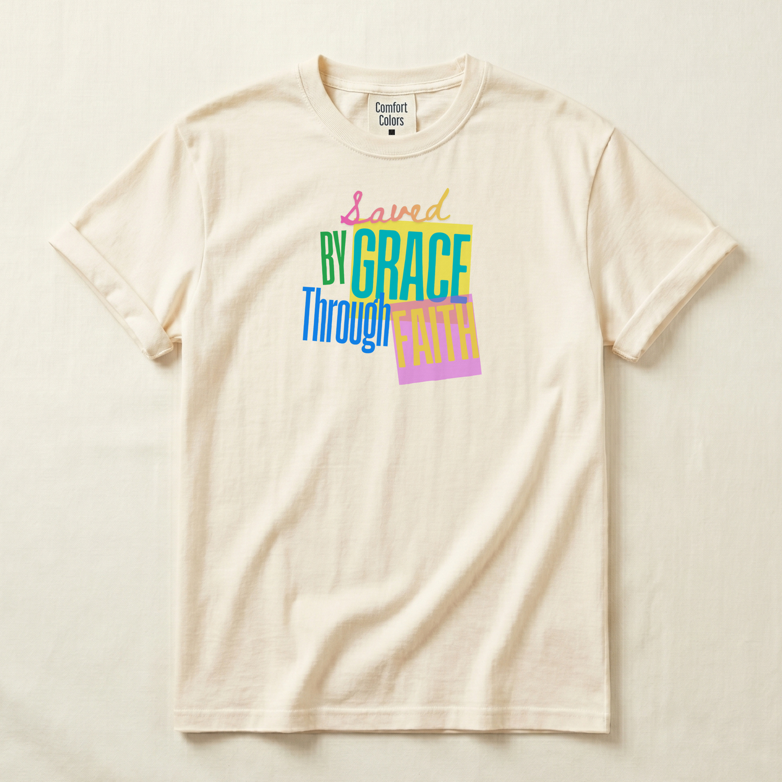 Saved by Grace Through Faith tee in Ivory, flat product shot
