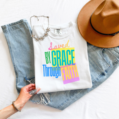Saved by Grace Through Faith tee in White, folded flat lay